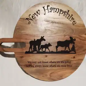 Moose Engraved Round Charcuterie Board for New Hampshire.