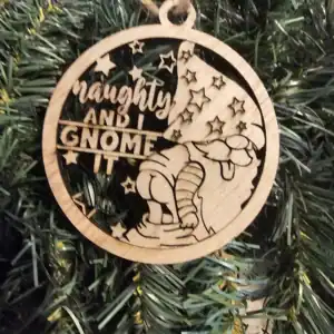 Naughty and Gnome It Christmas ornament with a gnome and stars, perfect for holiday decor.