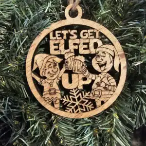 Elfed Up Christmas ornament with elves and snowflake design.