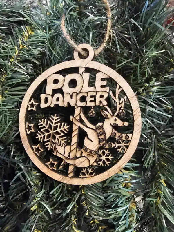 Decorative wooden pole dancer reindeer holiday ornament for festive decor.
