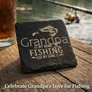 Rugged slate coaster engraved with "Grandpa is My Name, Fishing is My Game" for fishing enthusiasts.