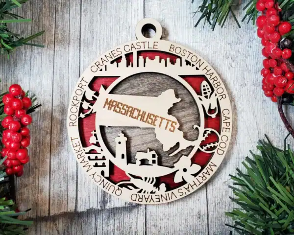 Massachusetts state ornament with laser-engraved landmarks and city names.