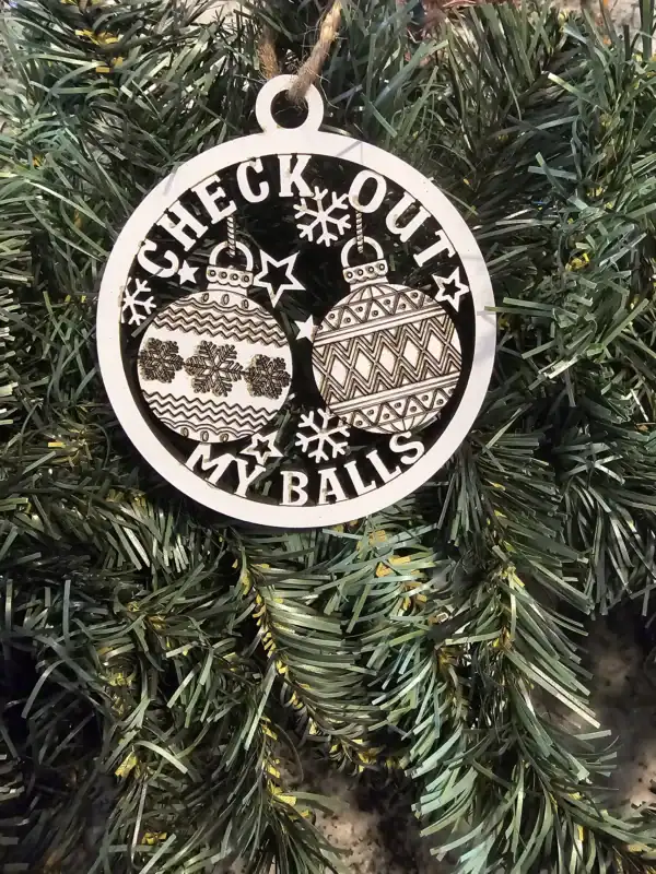 Funny Christmas ornament with decorated balls and holiday message.
