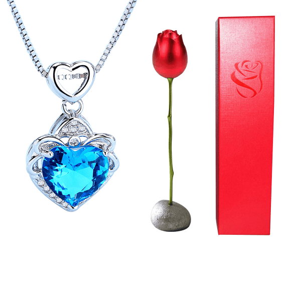Stunning heart-shaped blue gemstone pendant with silver chain jewelry. Perfect for special occasions.